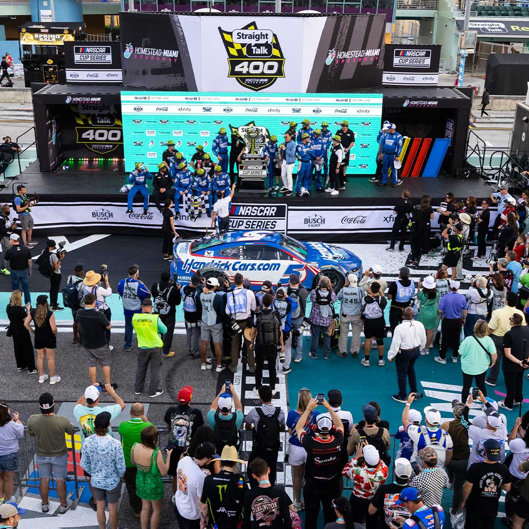 Photo with the race trophy in Victory Lane